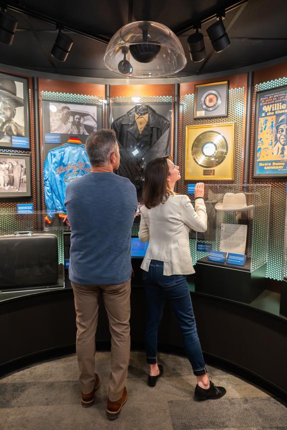 Couple exploring the Blues Foundation's Blues Hall of Fame.