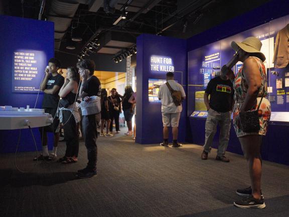 people inside National Civil Rights Museum new Legacy Experience looking at exhibits