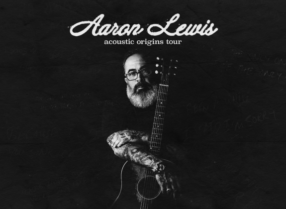 Aaron Lewis holding an acoustic guitar in the Acoustic Origins Tour graphic for his November 12 performance at the Cannon Center for the Performing Arts